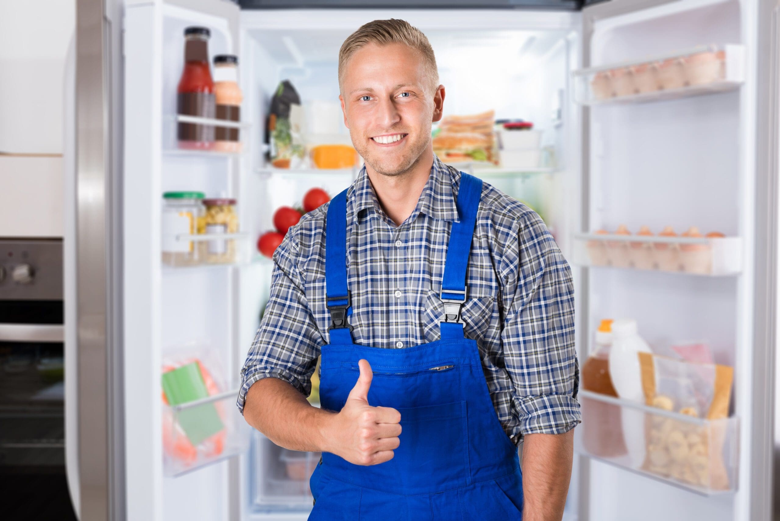 Man Fixing a Refrigerator